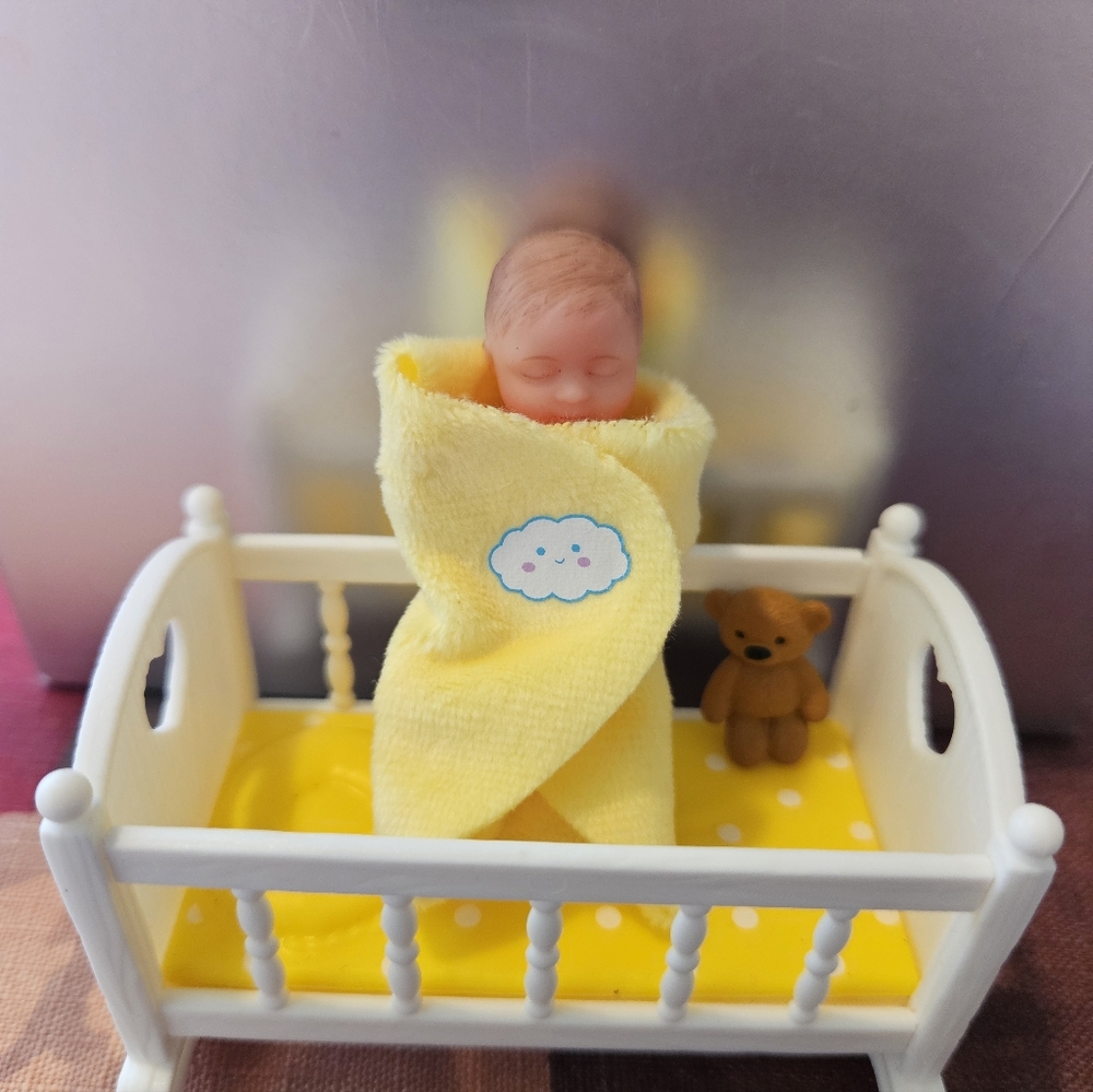 Zuru Mini Baby Doll in Yellow Swaddle with Brown Teddy in White Cradle - Picture 5 of 7